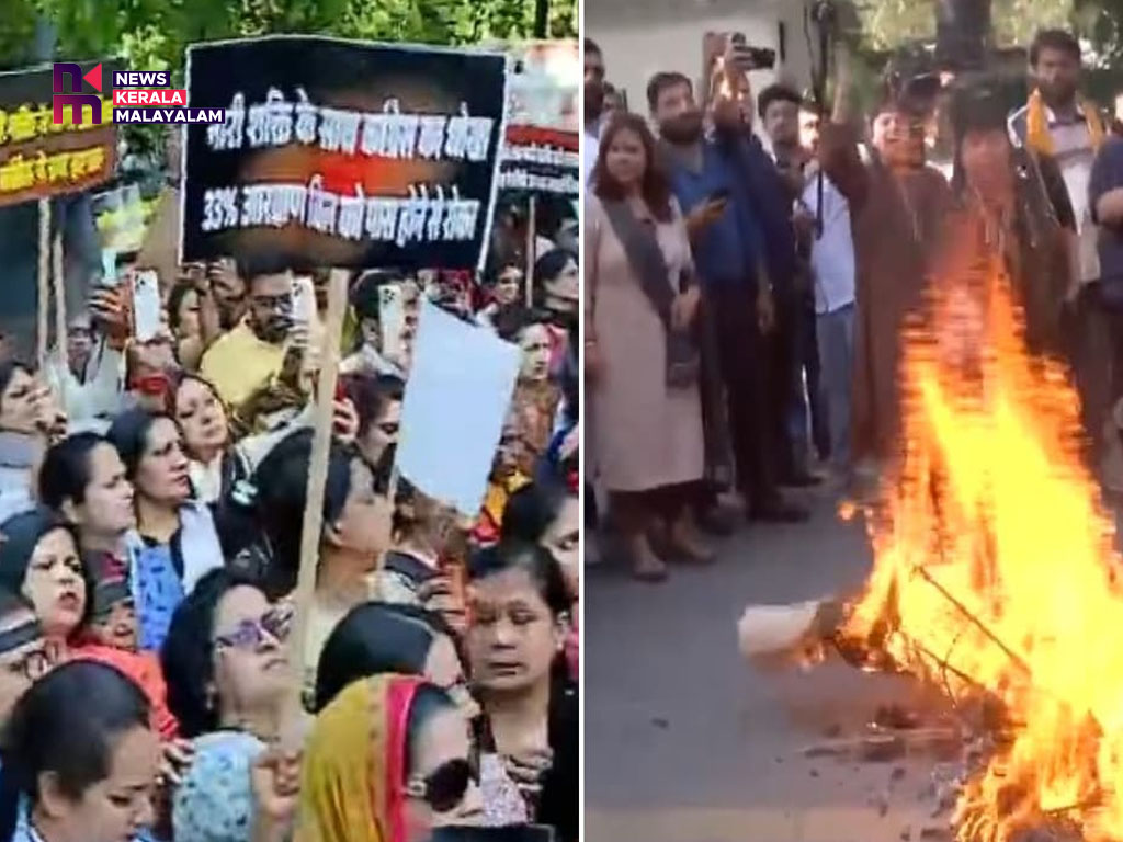 രാഹുൽ ഗാന്ധിയുടെ വസതിയിലേക്ക് മാ‍ർച്ച് നടത്തി മഹിളാ മോർച്ച; കോലം കത്തിച്ചു